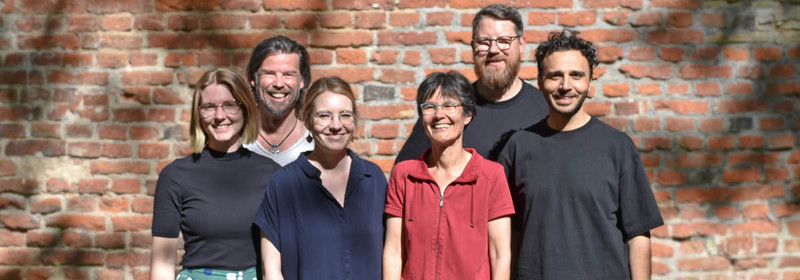 v. l. n. r. Lisa Vössing, Oliver Schneider, Debora Stockmann, Martina Steinke, Tomik Leusrock und Maher Seger Gruppenfoto des KSL.Münster